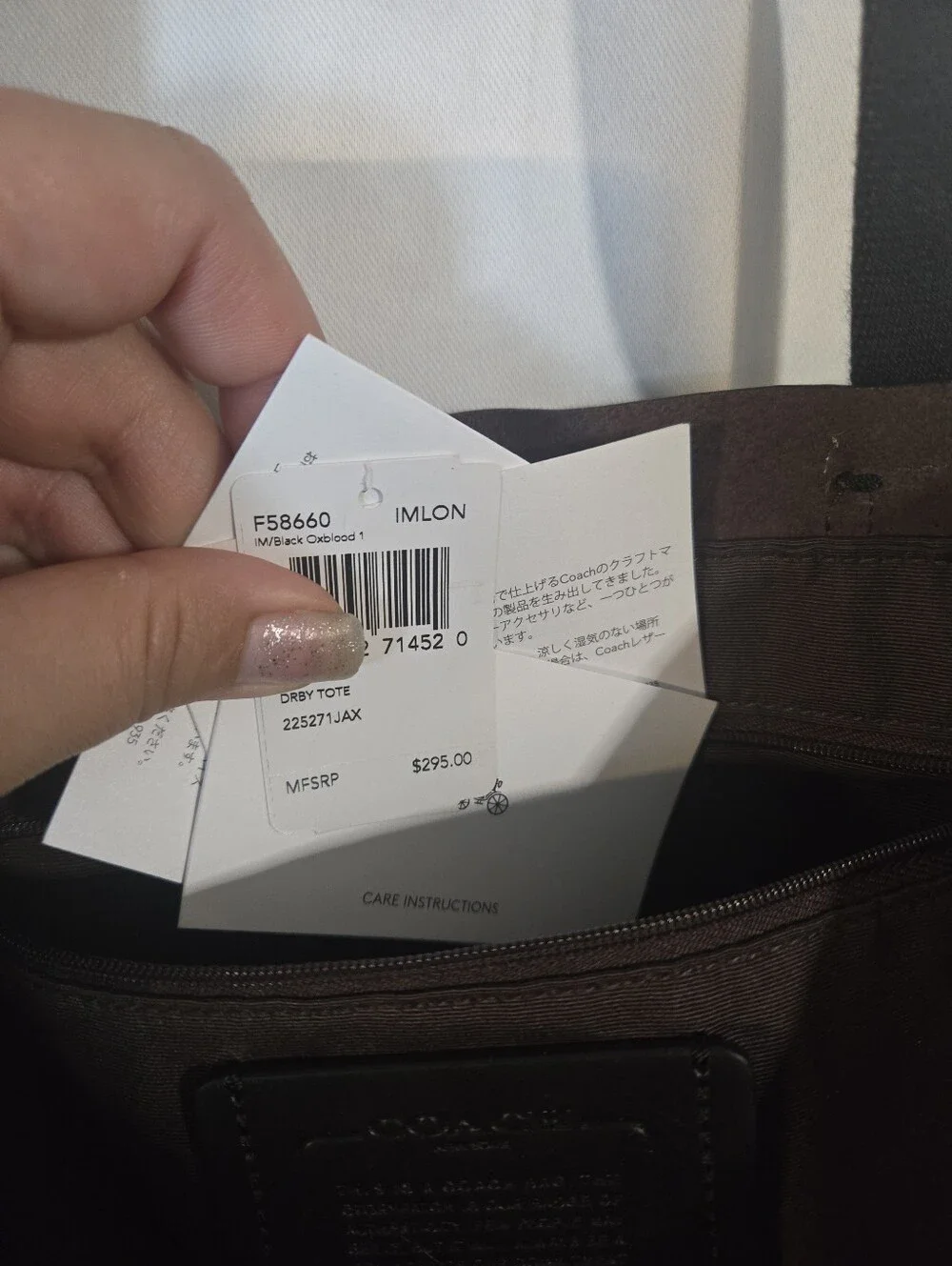 Coach Black Pebbled Leather Tote with Gold Tag